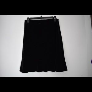 Tulip hemmed black velour skirt